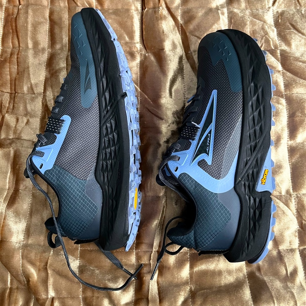 Altra blue/gray Timp 5 Trail Running shoes with Vibram grip soles.